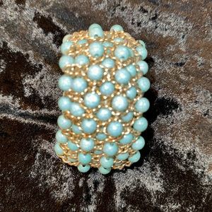 Turquoise bracelet with gold